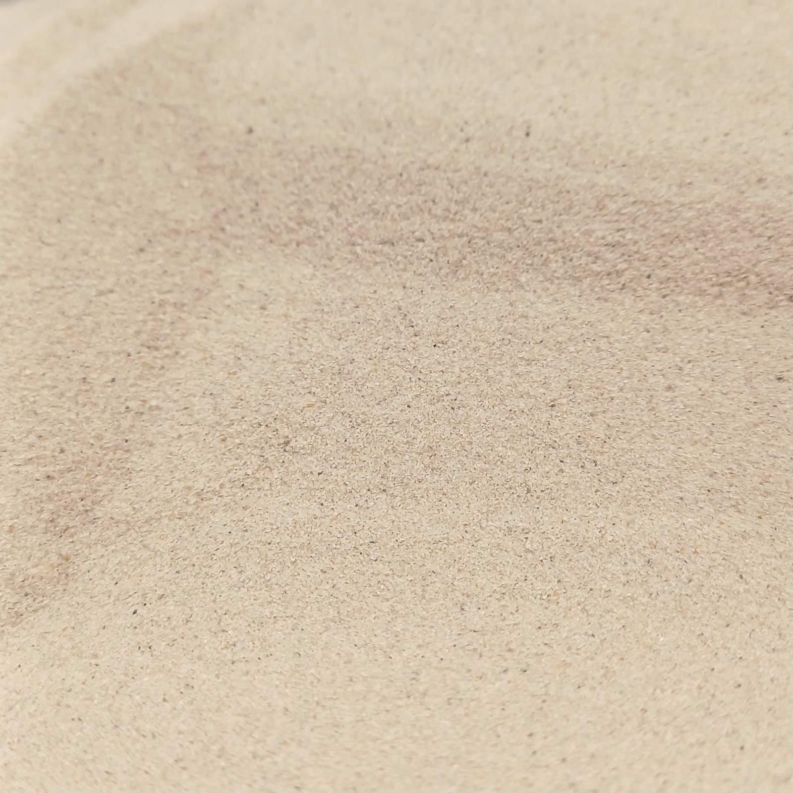 Aquariumsand Naturbeige, 0,1–0,4 mm, 25 kg: Nahaufnahme der Kornstruktur.